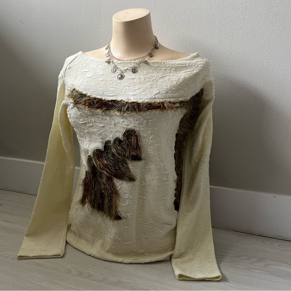 Off the should cream textured long-sleeve top with faux fur in shape of hearts